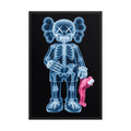 X-Rayed Companion framed poster featuring a translucent designer toy figure with X-ray skeletal detail and a pink companion on a black background.