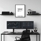 “Drive” motivational framed poster above dual monitor desk setup, modern tech workspace with hypebeast and designer wall decor style