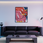Colored Porsche framed poster displayed above a black sofa in a modern living room with ambient lighting and minimalist decor.